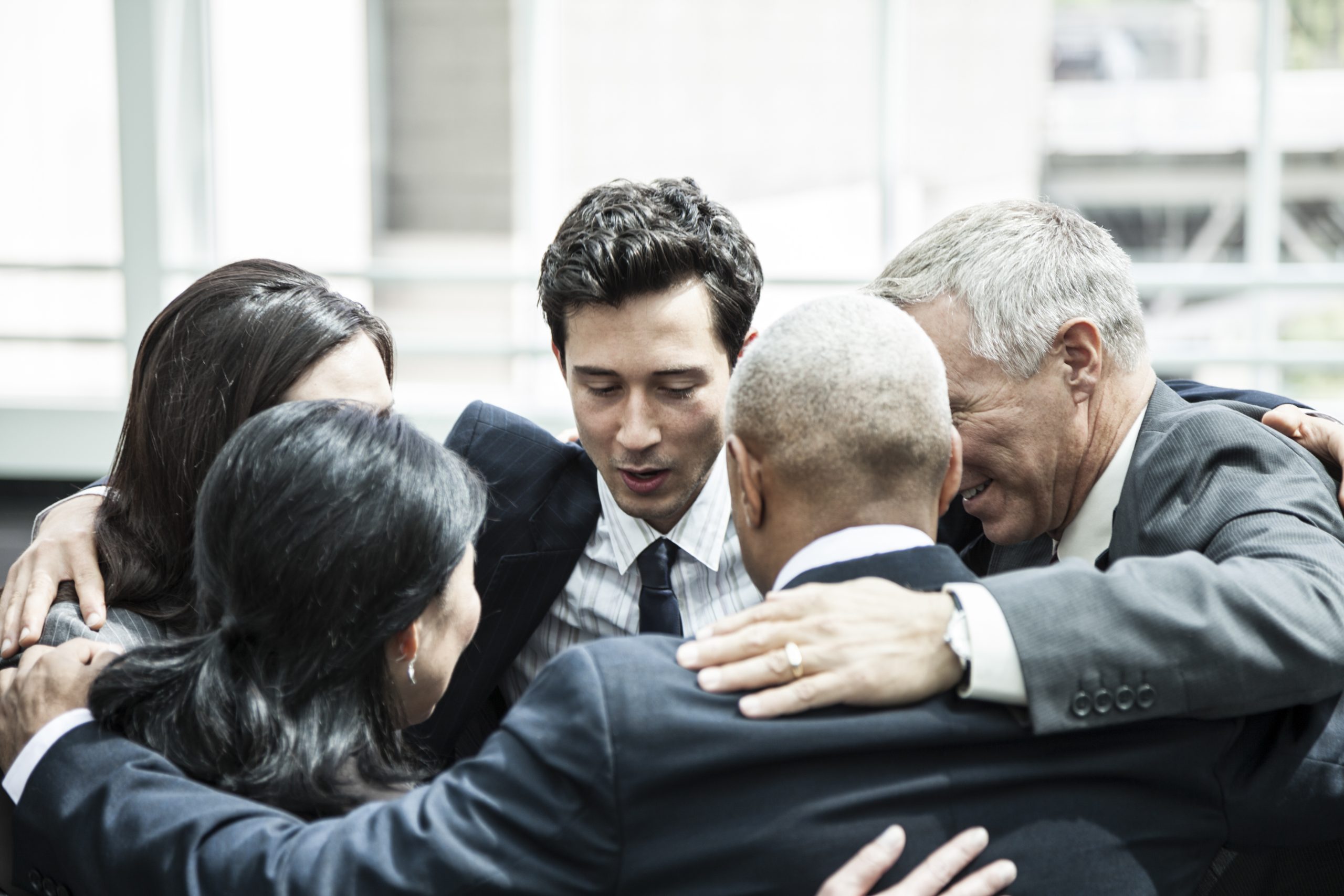 Upskill Now Team Building 1 Upskill Now - mixed race group of business people in an informal 2022 03 04 02 14 18 utc scaled